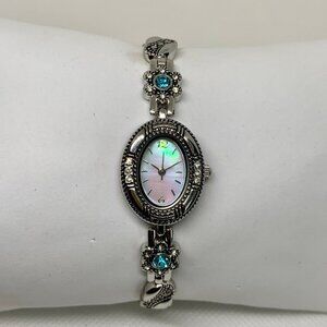 FMD women silver tone dress watch oval 20mm quartz analog rhinestones running